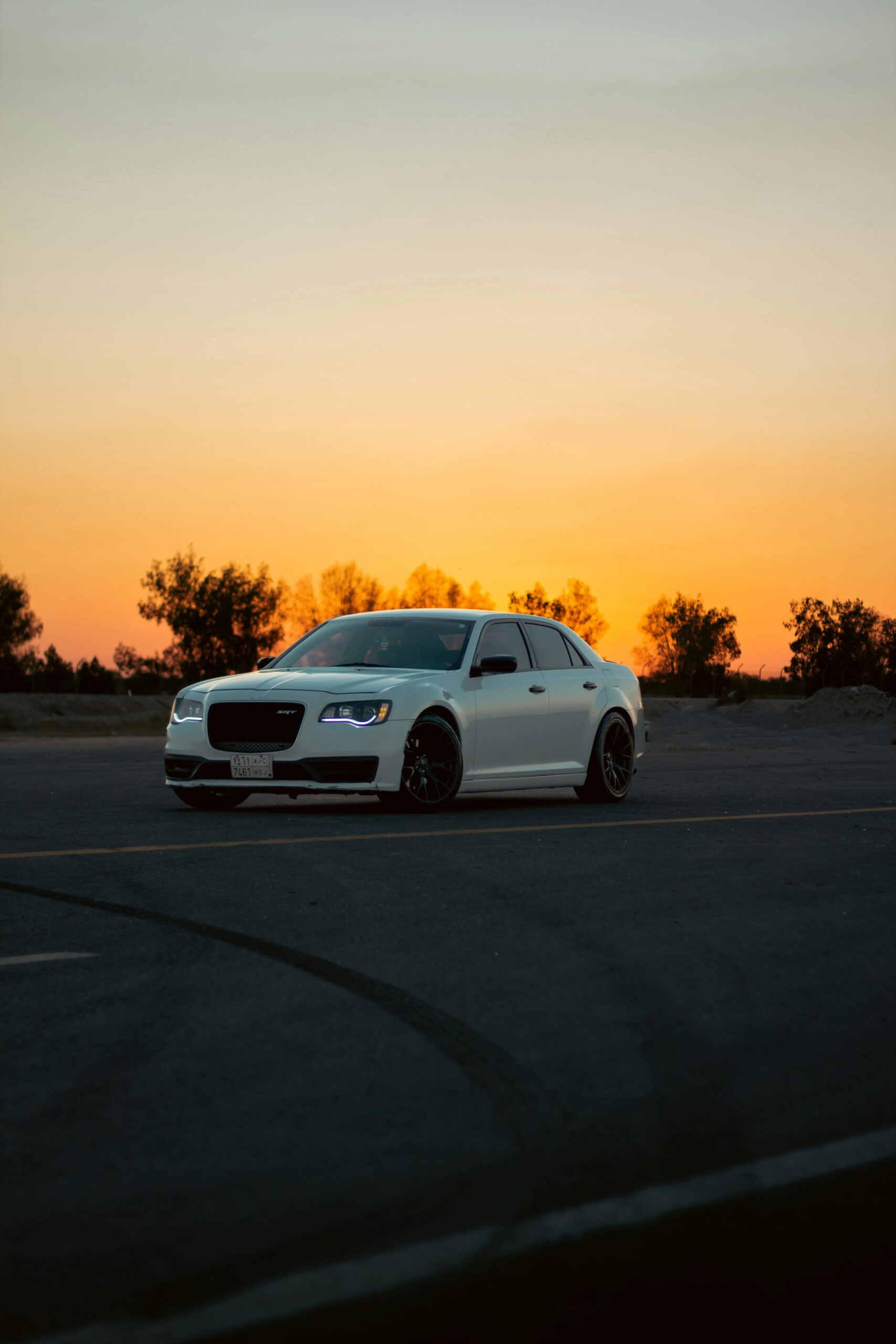 Chrysler 300C at golden hour, countryside barn wedding Daventry, Silver Crown Weddings, www.silvercrownweddings.com, 07345686009, contact@silvercrownweddings.com